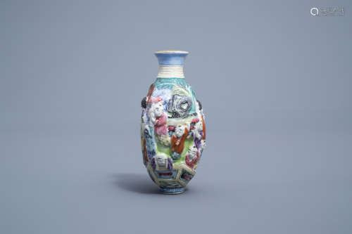 A Chinese famille rose relief molded snuff bottle with ladie...