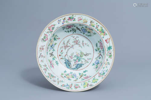 A Chinese famille rose bowl with birds among blossoming bran...