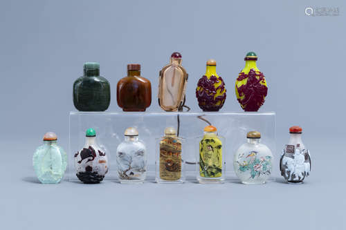 Twelve Chinese glass and hardstone snuff bottles, 20th C.