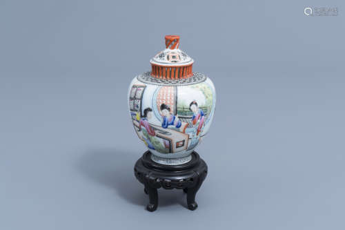 A Chinese famille rose vase and cover with ladies playing mu...