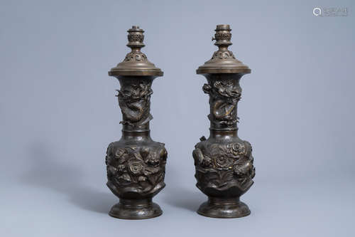 A pair of impressive Japanese partly gilt bronze vases with ...