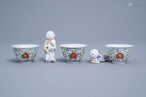 Three Japanese Kakiemon bowls and two boy shaped whistles, E...