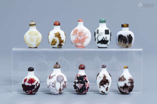 Nine Chinese overlay glass snuff bottles and one in agate, 2...