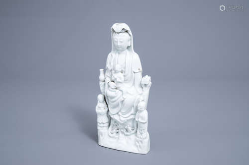 A Chinese blanc de Chine group of Guanyin with servants, 19t...