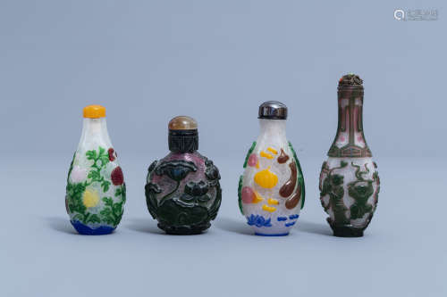 Eight Chinese multi-colour overlay glass snuff bottles, 20th...