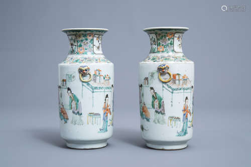 A pair of Chinese famille verte vases with figurative design...