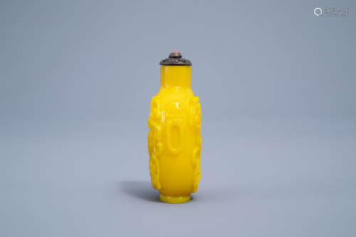 A Chinese yellow Beijing glass snuff bottle with dragons, Qi...