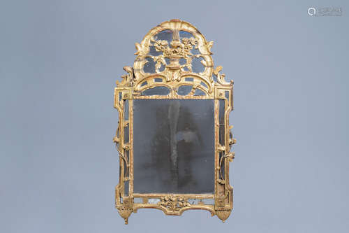 A French gilt wood mirror, 18th C.