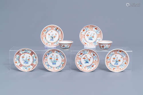 Six Japanese Kakiemon saucers and two cups with floral desig...