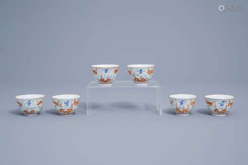 Six Japanese Kakiemon cups with parrots among blossoming bra...