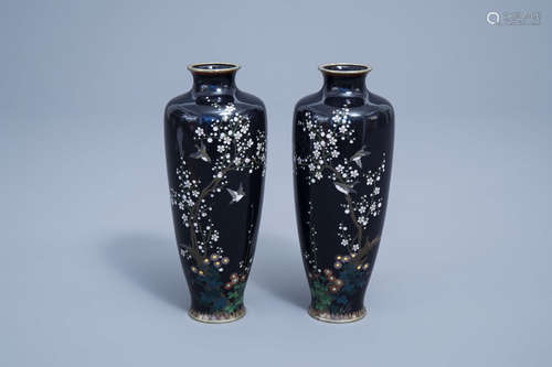 A pair of fine Japanese cloisonne vases with birds among blo...