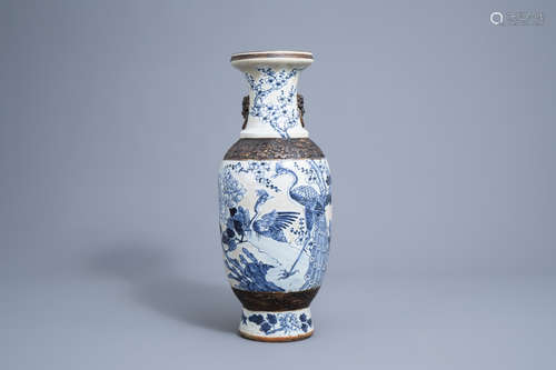 A Chinese blue and white Nanking crackle glazed vase with pe...