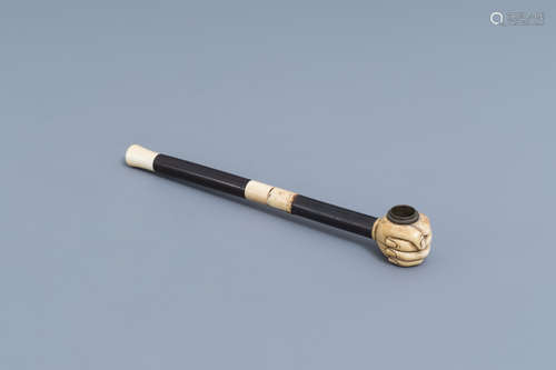 A Chinese hardwood and ivory travel opium pipe, 19th C.