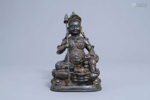 A Sino-Tibetan partly gilt and lacquered bronze figure of Ja...