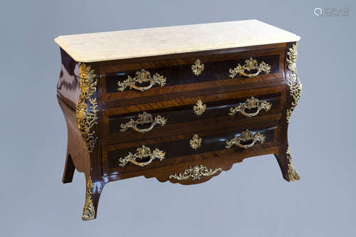 A French veneered gilt bronze mounted Louis XV style chest o...