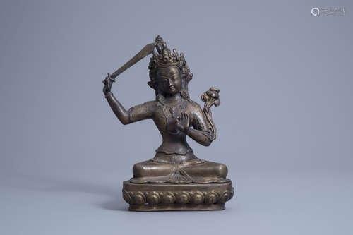 A Sino-Tibetan bronze figure of Manjusri, 19th/20th C.