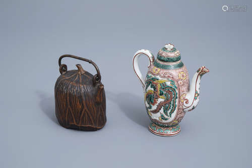 A Japanese Satsuma teapot and cover and one in carved wood, ...