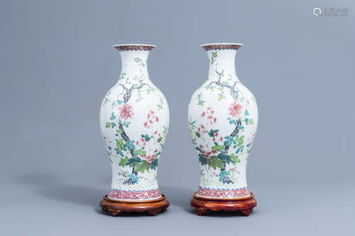 A pair of Chinese famille rose vases with floral design, Hon...