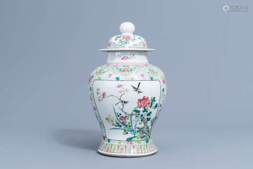 A Chinese famille rose vase and cover with birds among bloss...