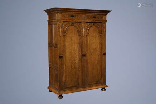 A Dutch oak cupboard 'toogkast', 17th C. and later