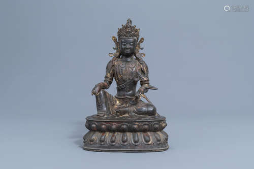 A large Chinese gilt-lacquered bronze figure of Buddha, 19th...