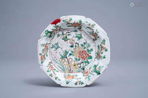 A lobed Chinese famille verte plate with a bird among blosso...