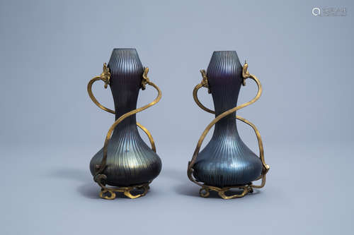 A pair of iridescent Art Nouveau style double gourd vases in...