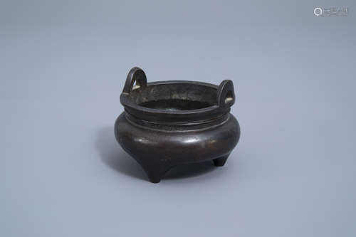 A Chinese bronze tripod censer, 19th C.