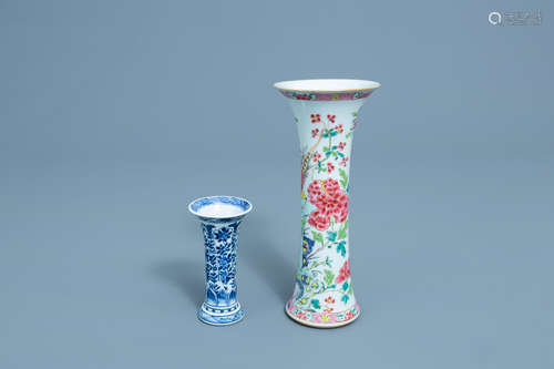 A Chinese famille rose gu vase with a bird and a blue and wh...