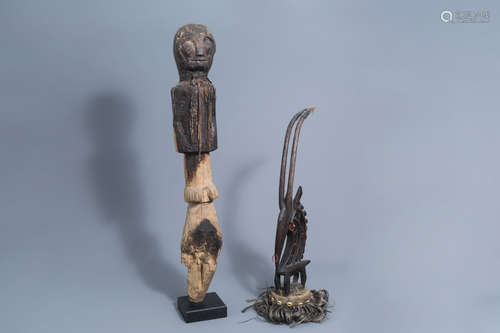 A Chi Wara headdress, Bamana, Mali, and a wooden person shap...