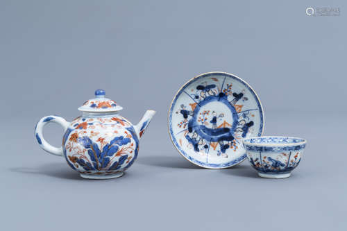 A Chinese Imari style teapot and cover and a cup and saucer ...