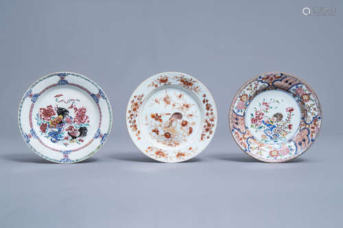 Three Chinese famille rose and iron red 'rooster' plates, Yo...