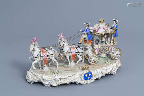 A group with a four-in-hand carriage in polychrome Saxon por...