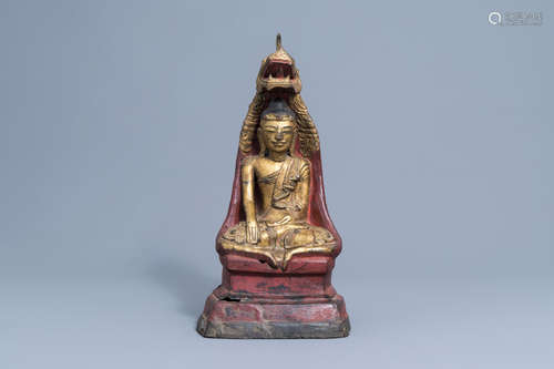 A large gilt, lacquered and polychrome Buddha with inlay, Bu...