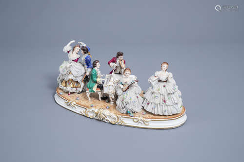 A group with a piano concerto in polychrome Saxon porcelain,...