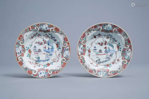 A pair of Chinese deep famille rose plates with figures and ...