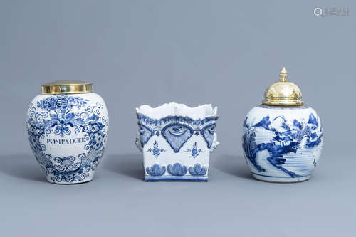 A Dutch Delft blue and white tobacco jar, a French jardinir...