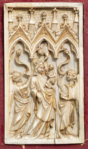 A French Gothic Revival carved ivory panel with the Coronati...