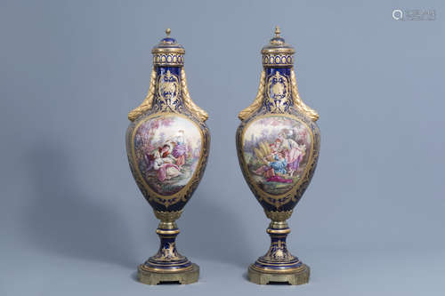 A pair of large French Svres styles vases and covers with g...