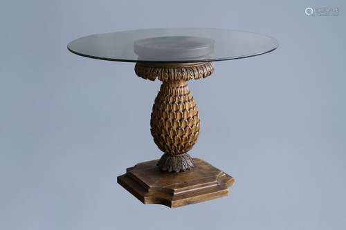 A wooden 'pineapple' table with round glass top, ca. 1900