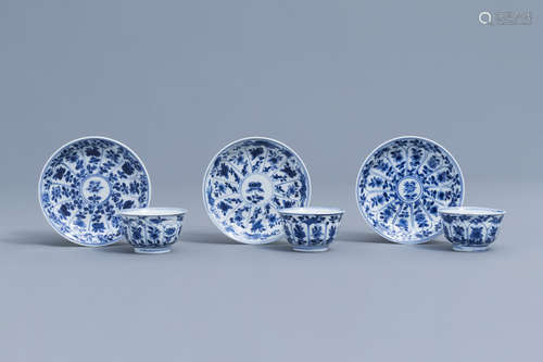 Three Chinese blue and white cups and saucers with floral de...