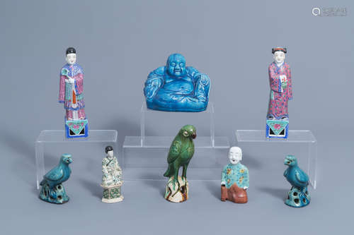 A varied collection of Chinese porcelain figures and birds, ...