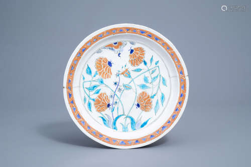 A polychrome Iznik style dish with floral design, Kutahya, T...