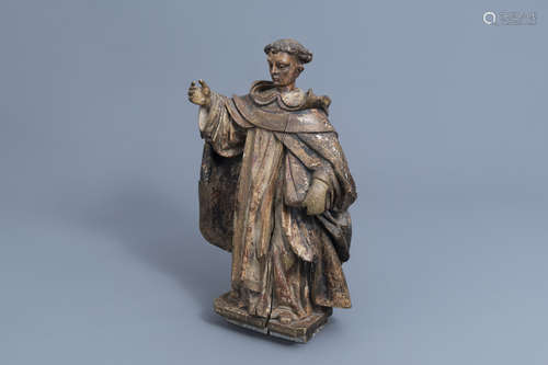 An Italian carved, polychrome painted and gilt wooden figure...