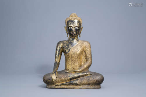 A large Thai gilt lacquered bronze figure of Buddha Maravija...