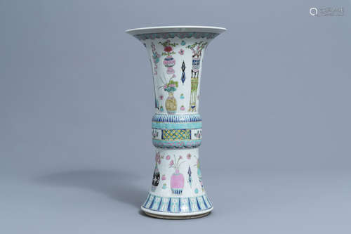 A Chinese famille rose 'gu' vase with antiquities, 20th C.