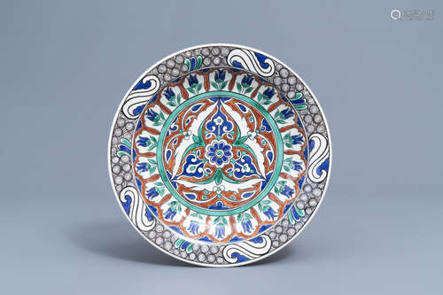 A polychrome Iznik style charger with floral design, Boch Fr...