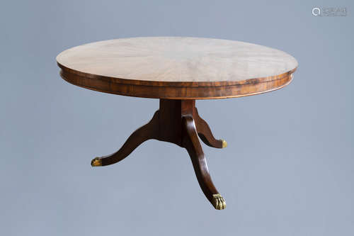 A circular English Regency mahogany tripod breakfast table w...