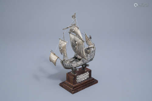 A Spanish silver model of the 'Santa Maria' on a wooden base...