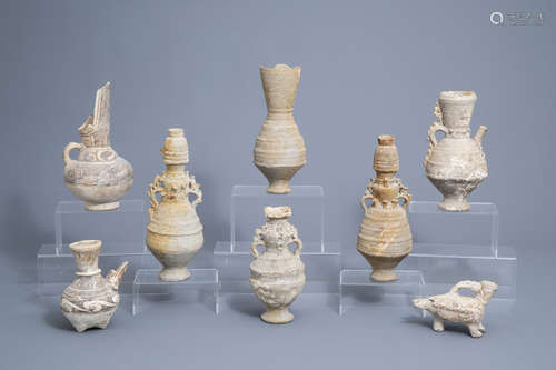 Eight various unglazed pottery urns and ewers, a.o. Thai, 14...